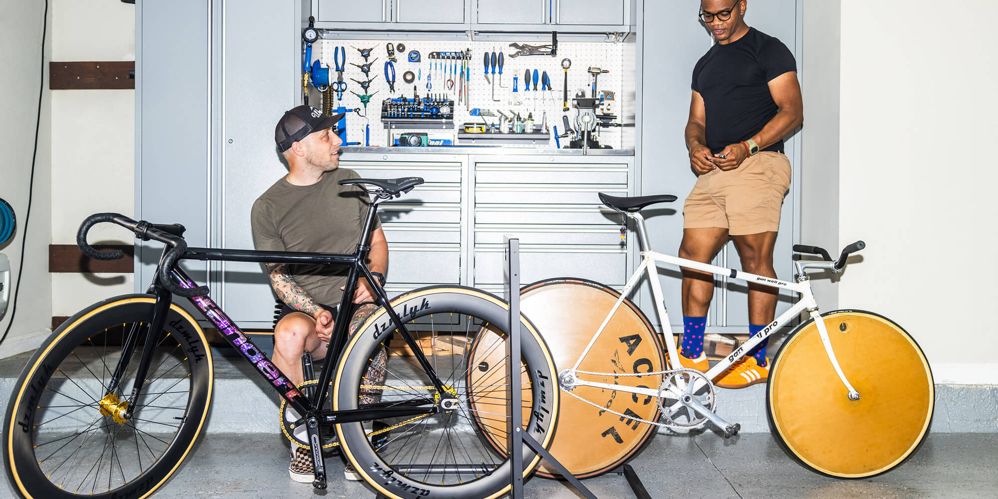 Friends fixing their bikes